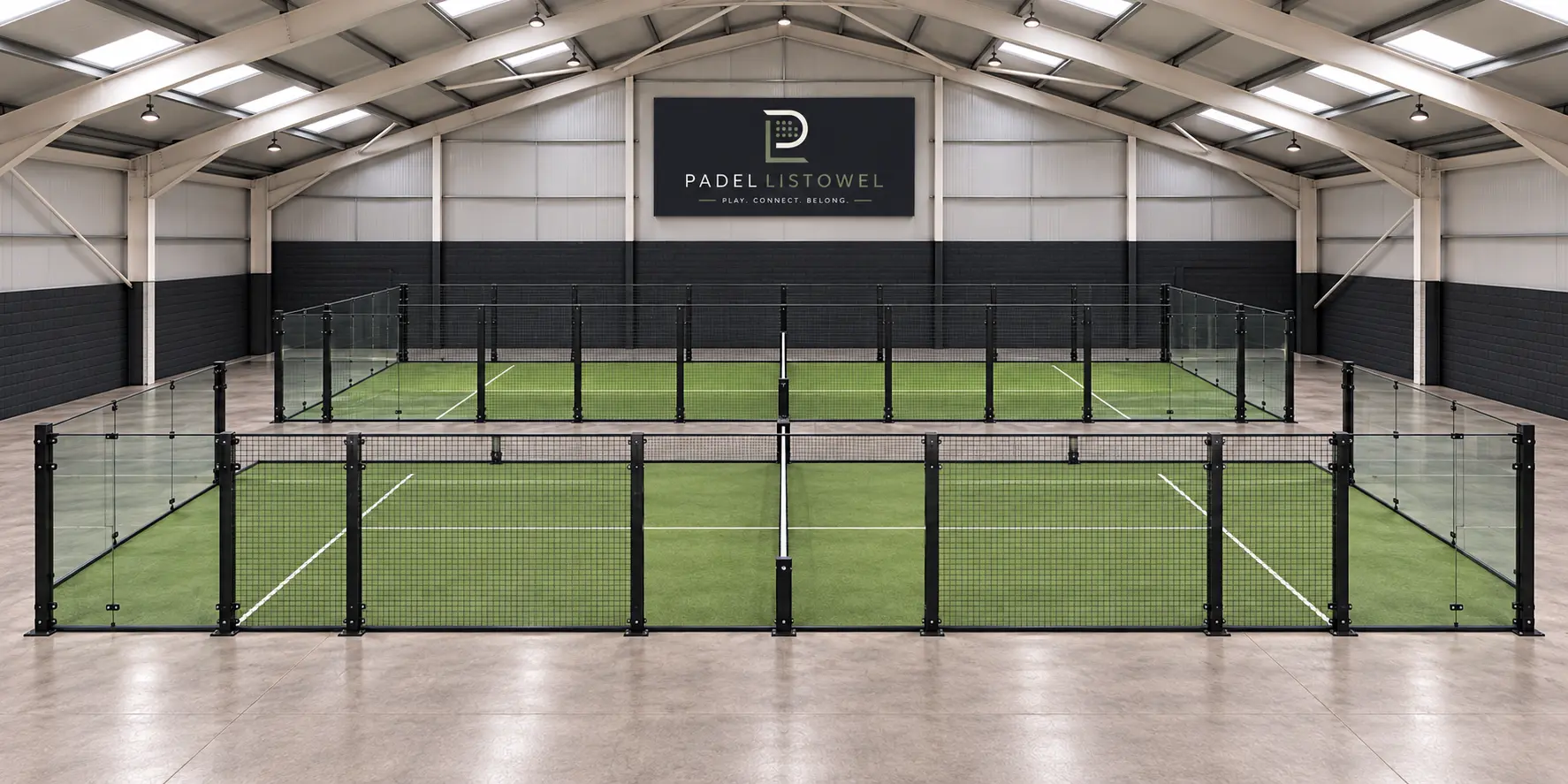 Illustrative CGI of green padel courts running across the hall, with glass and black steel mesh sections
